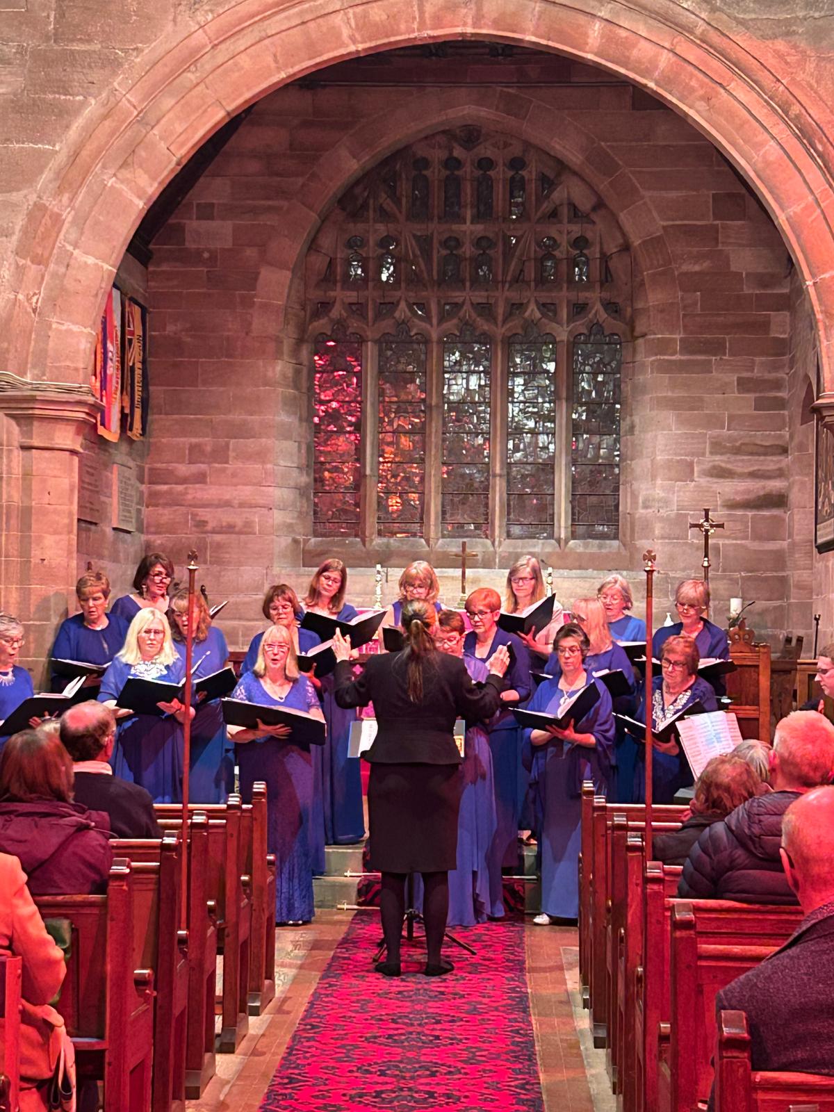 One Achord performing together at a concert in Tilston Church.